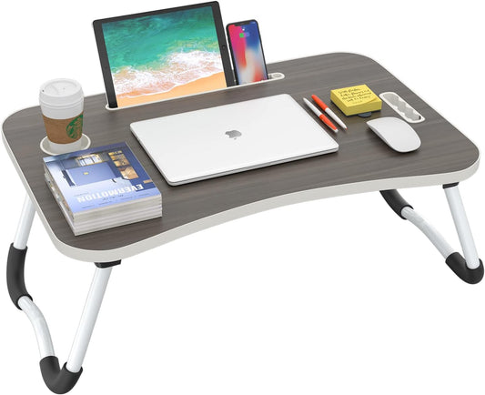 or working, reading, writing, eating, and watching movies, this 23-inch foldable laptop desk is made of wood and black and comes with a cup holder